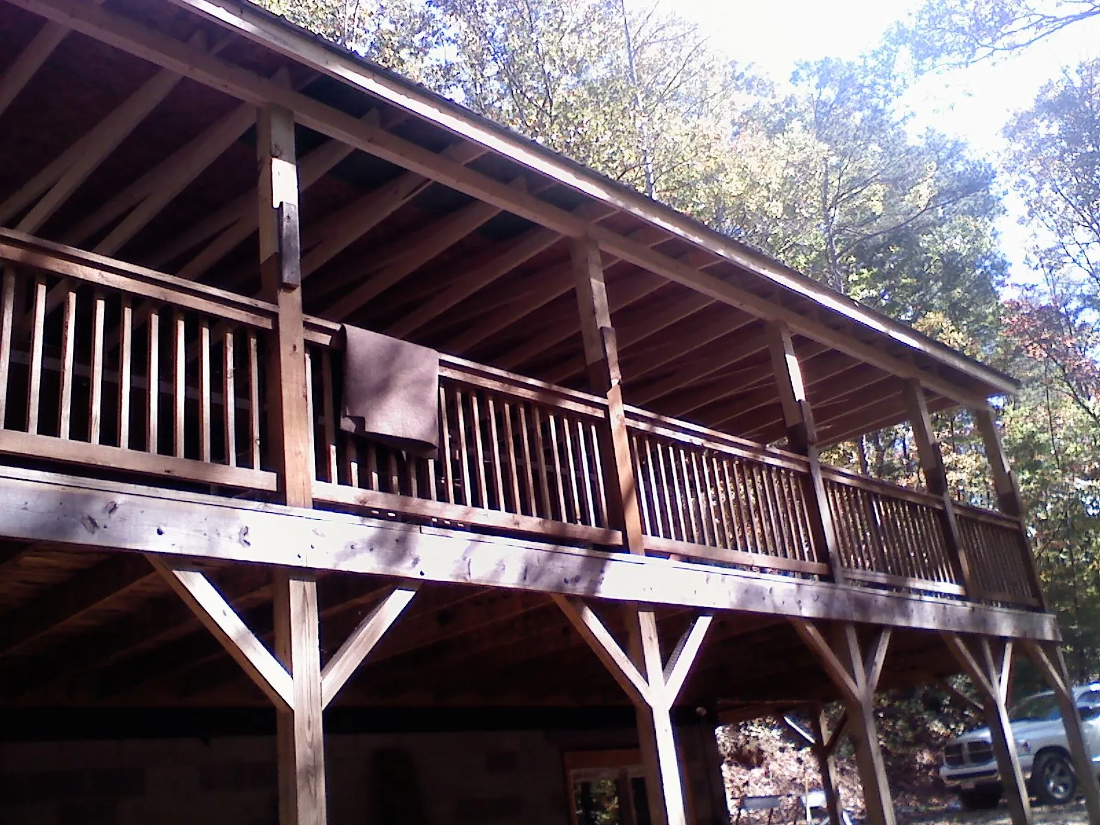 Timber framing under a new elevated porch and deck — Roof Leak Repair in Moffit by Roofing Brothers
